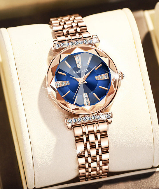 Women’s diamond mirror fashion steel watch with round dial, stainless steel strap, and waterproof quartz movement.