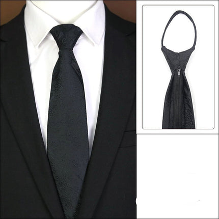 Black tie with knot-free zipper feature on a suit.