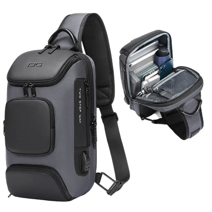 Gray sling bag with USB charging port and multiple compartments on a gray background