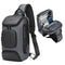 Gray sling bag with USB charging port and multiple compartments on a gray background