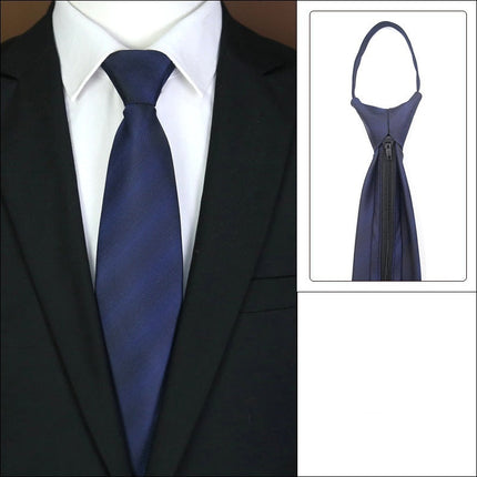 Blue tie with a zipper on a white background, shown on a suit.