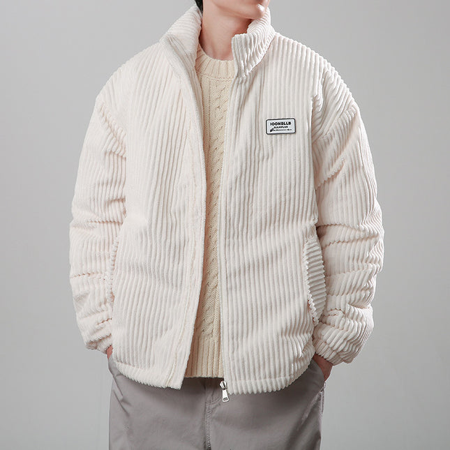 Person wearing a beige corduroy jacket