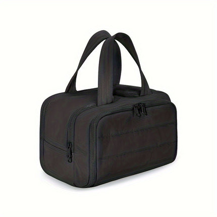 Black toiletry bag with handles on a white background