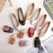 Colorful assortment of foldable ballet shoes with soft bottoms and bows in various shades on a stylish background.