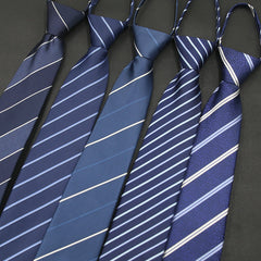 Set of blue striped ties on a dark background