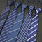 Set of blue striped ties on a dark background