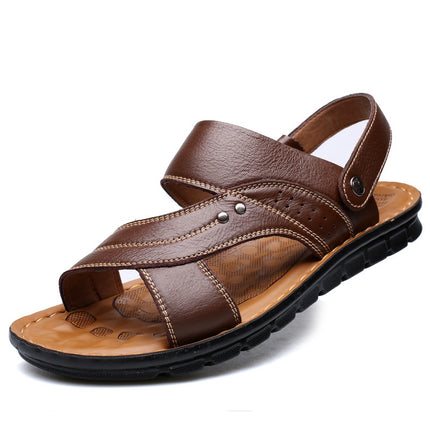 Brown leather sandal on a white background
