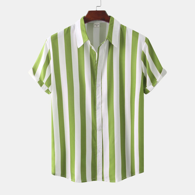 Green and white striped shirt on a hanger against a white background